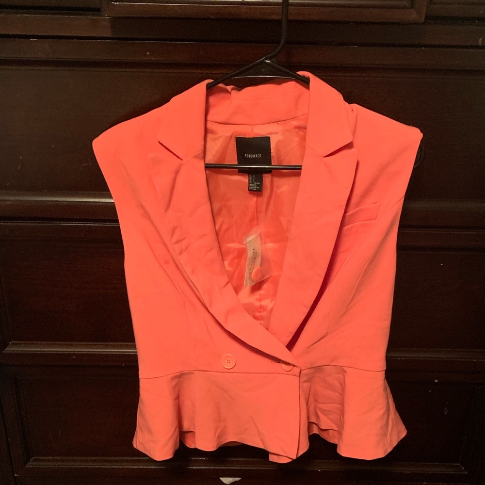 Never worn orange dressy sleeveless blouse